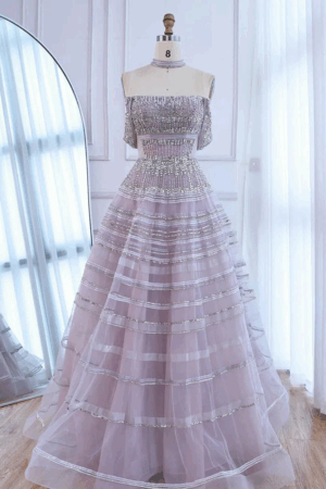 فستان سهرة وردي فخم بكتف مكشوف وتطريز فاخر